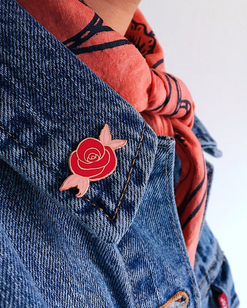 Eradura Desert Rose Enamel Pin in Rose Gold Metallic Finish and Red and Pink Enamel on Denim Jacket